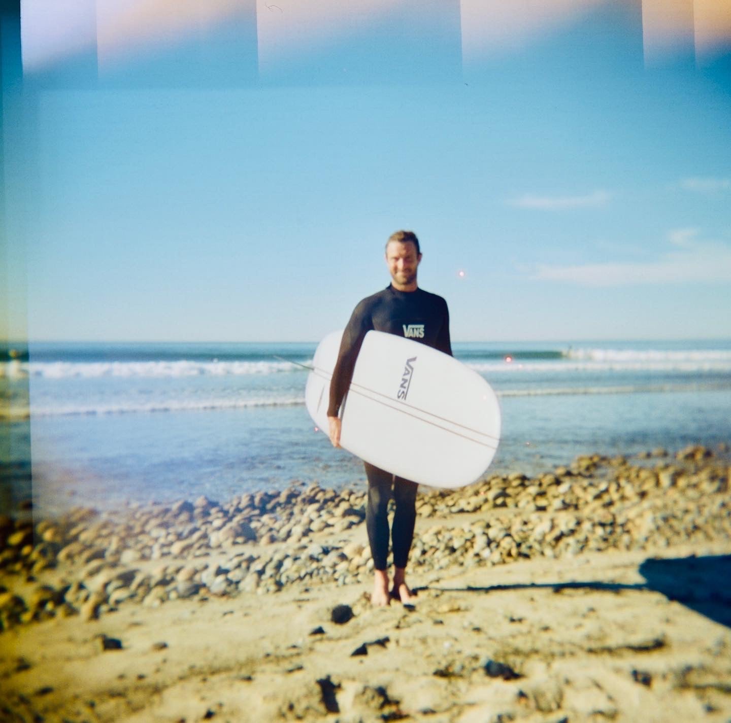 Dean Petty surfing