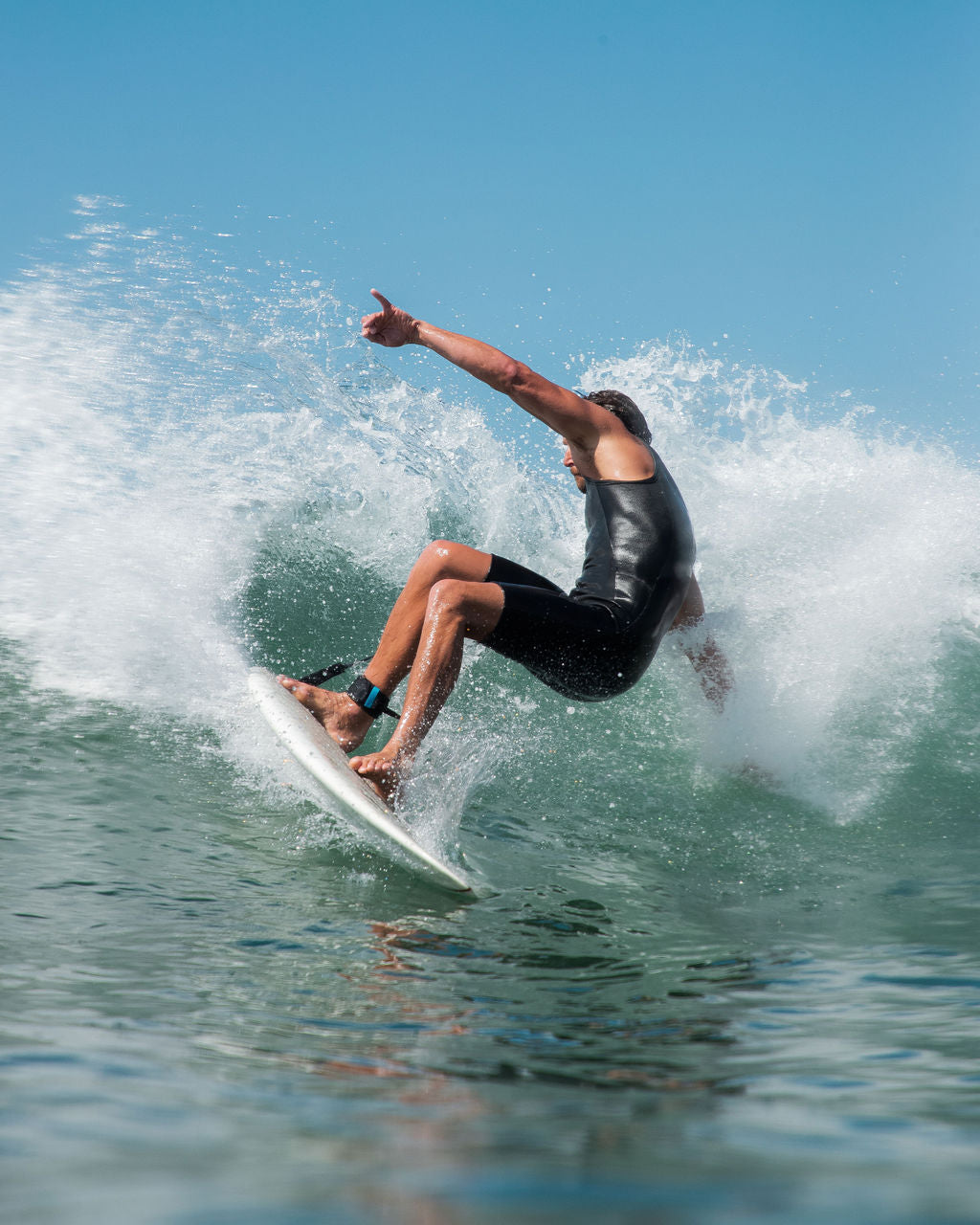 Dean Petty surfing
