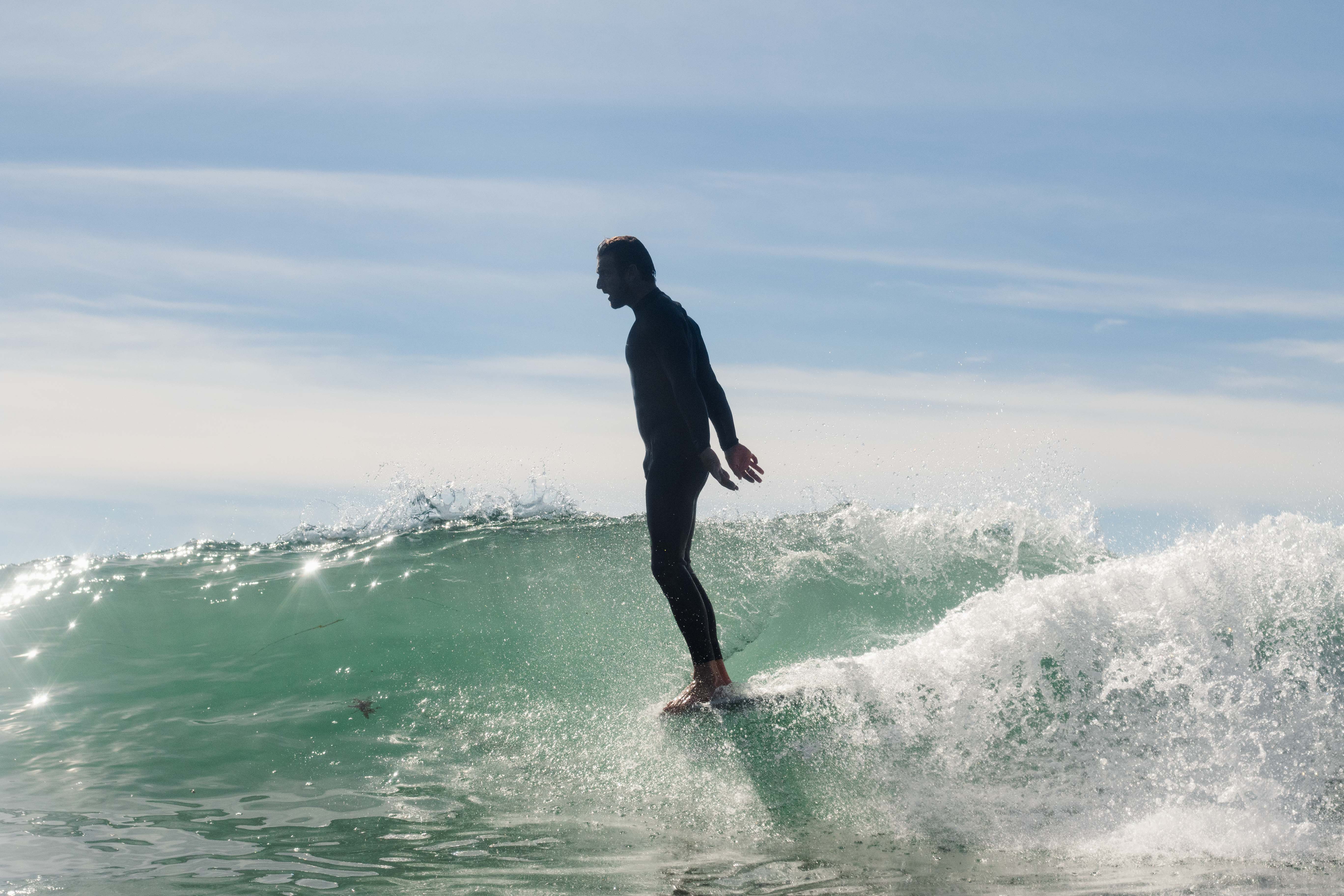Dean Petty surfing